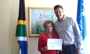 Skinstad presents Mayor with proceeds from Golf Challenge